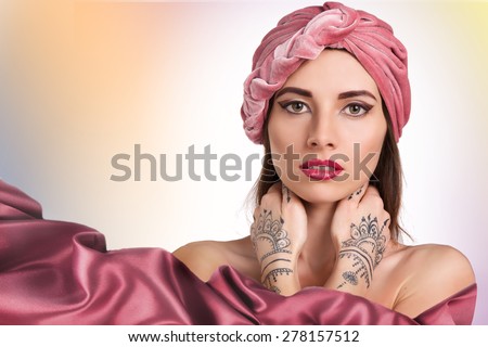 beautiful stylish woman in oriental style in turban