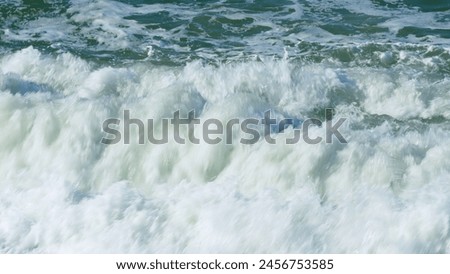 Similar – Image, Stock Photo Foamy waves rolling up in ocean