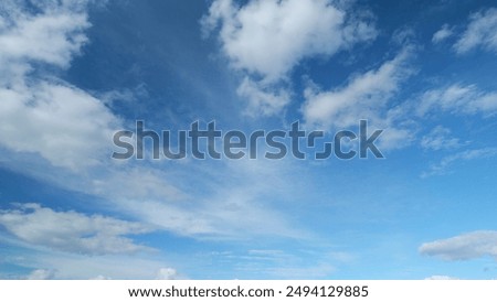 Similar – Foto Bild Ein Wolkenband zieht vorbei, die Silhouetten alter Eukalyptus Bäume am Horizont heben sich vom orangenem Himmel ab als die Sonne untergeht. Dunkelheit legt sich über das Maisfeld im Vordergrund