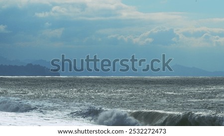 Similar – Image, Stock Photo Foamy waves rolling up in ocean