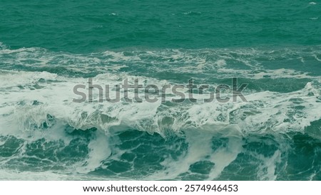 Similar – Image, Stock Photo Foamy waves rolling up in ocean