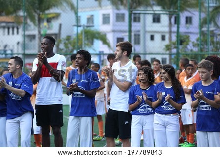 Rio de Janeiro, Brazil June 9, 2014 - Players of the English national football team, visit the community of Rocinha and play Capoeira with the locals. No Use in Brazil.