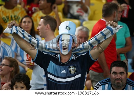RIO DE JANEIRO, BRAZIL - June 15, 2014: Soccer fans celebrating at the 2014 World Cup Group F game between Argentina and Bosnia at Maracana Stadium. No Use in Brazil
