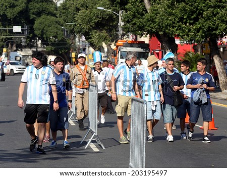 RIO DE JANEIRO, BRAZIL - June 15, 2014: Soccer fans arriving to the 2014 World Cup Group F game between Argentina and Bosnia at Maracana Stadium. No Use in Brazil.