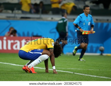 BELO HORIZONTE, BRAZIL - July 8, 2014: Marcelo of Brazil reacts at the end of the World Cup Semi-finals game between Brazil and Germany at Mineirao Stadium. NO USE IN BRAZIL.