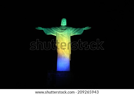 Rio de Janeiro, Brazil, August 5, 2014 Christ the Redeemer (Corcovado), lit with the Olympic colors, to remember missing two years for the Olympic Games in Rio de Janeiro, not use in brazil