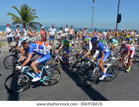 Competitors ride near Barra da Tijuca  beach during the Road Cycling Challenge in Rio de Janeiro, Brazil, August 16, 2015.  Road Cycling  is a test event for the Rio 2016 Olympic Games.