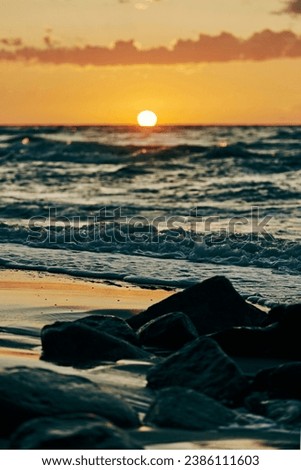 Similar – Image, Stock Photo Stony seashore and waves at beautiful sunset