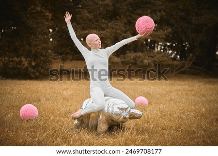 Similar – Image, Stock Photo teenager with wig sitting on a sofa next to a fish