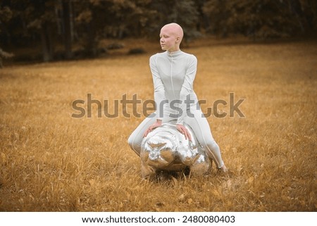 Similar – Image, Stock Photo teenager with wig sitting on a sofa next to a fish