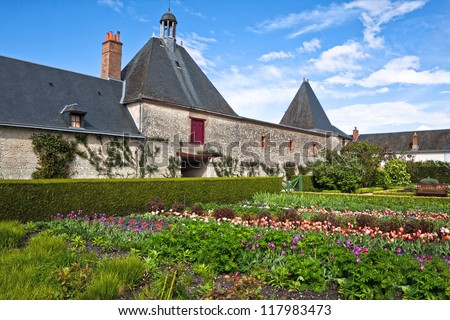 Rows of herbs and vegetables growing in a market garden at Cheverny, France