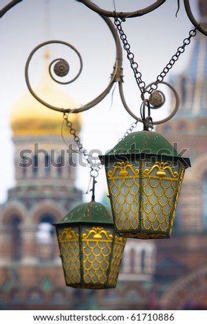 Decorative lanterns and Church of the Savior on Spilled Blood, St. Petersburg. Russia