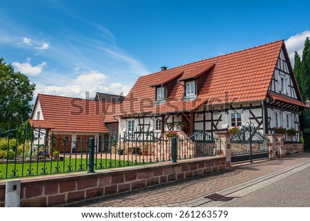 Traditional half-timbered houses in the streets of the small town of Seebach in Alsace, France