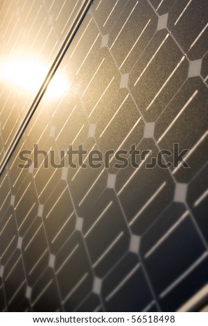 Texture detail of photoelectric cells of a solar panel -Blue and ecology energy. (Photographed with shallow DOF, selective focus)
