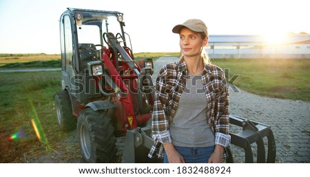 Similar – Image, Stock Photo Female farmer with tractor on olive plantation