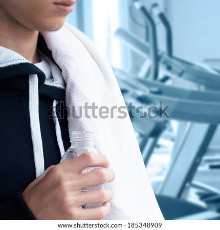 Young boy at the gym exercising