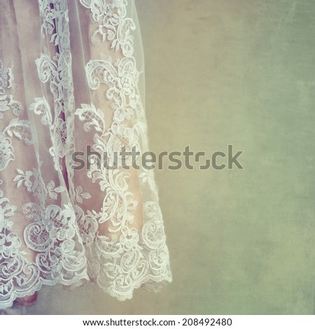 Close up detail of vintage style wedding dress on a hanger