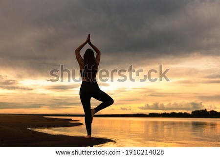 Similar – Image, Stock Photo Girl who practices yoga at home. Concept of health.