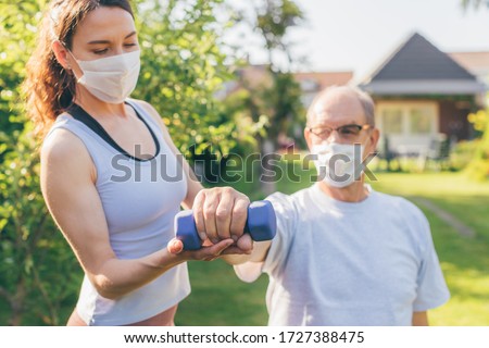 Similar – Image, Stock Photo Woman making facemasks for coronavirus pandemic