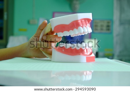 Dental model on dentistry office background