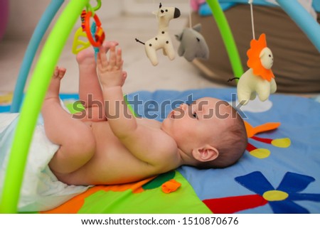 Similar – Image, Stock Photo Kid grabs his toy Child