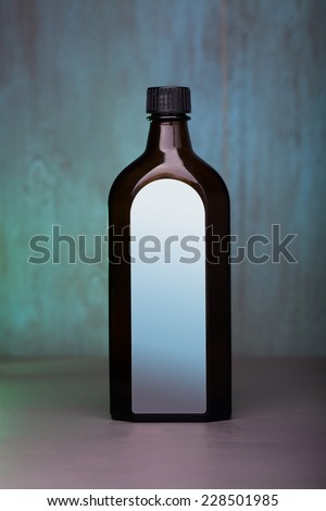glass; remedy; bottle; cure; background; wood; blue; natural; health; therapy; spa; care; medicine; sirup; suspension;