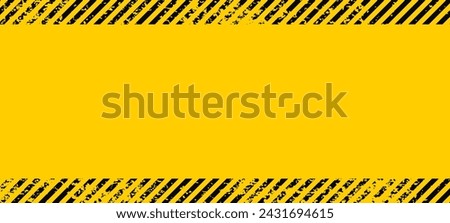 Grunge yellow and black diagonal stripes. Industrial warning background, warn caution, construction, safety