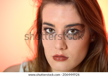 Beautiful young woman with coffee bean make up