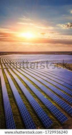 Similar – Foto Bild Solarenergie-Farm. Hochformatige Ansicht von Solarmodulen in einem Energiepark