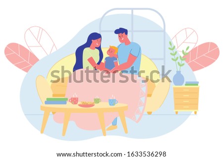 Cozy Atmosphere Evening in Young Family with Tea. Parents Communicate with their Son, Sit on Couch and Hide in Soft Blanket. They have Cookies and Hot Drinks on Table, Joint Rest Strengthens Family.
