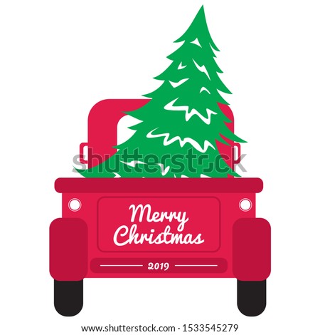 Vintage pickup truck with christmas tree