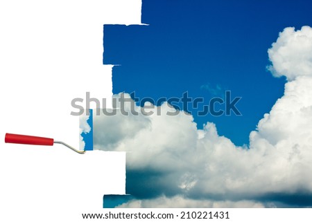 paint roller painting a beautiful blue sky on white background