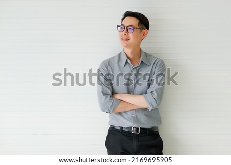 Similar – Image, Stock Photo Asian man in eyeglasses on street