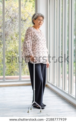 Similar – Image, Stock Photo woman with walking sticks on a hiking trail, forest path