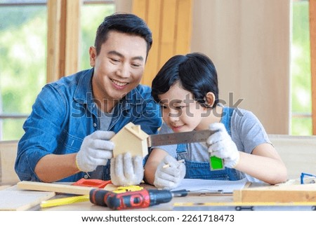 Similar – Image, Stock Photo Male woodworker teaching son in workshop