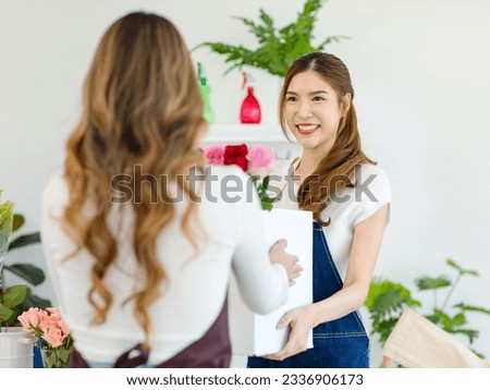 Similar – Image, Stock Photo Unrecognizable female professional florist making bouquets.