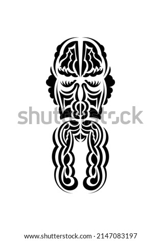 Mask in traditional tribal style. Black tattoo patterns. Isolated on white background. Vetcor.
