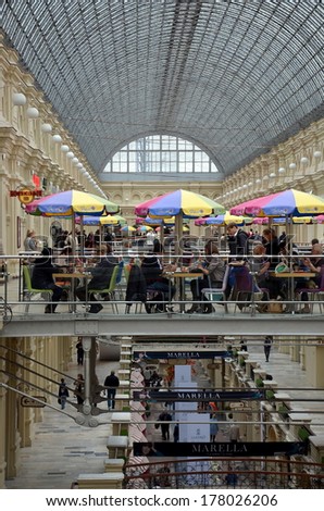 MOSCOW, RUSSIA, SEPTEMBER 6, 2013:  The GUM shopping mall interior,  Moscow; This shopping mall celebrates 120th aniversary in 2013