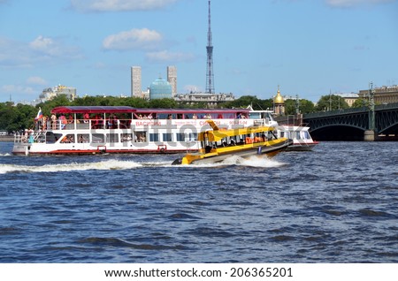 SAINT-PETERSBURG, RUSSIA, JULY 20, 2014: Aquabus overtakes excursion  boat  on the river Neva, St. Petersburg, Russia