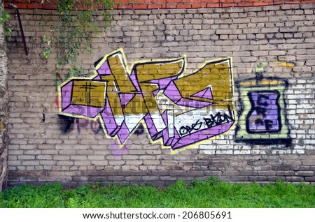SAINT-PETERSBURG, RUSSIA, JULY 23, 2014: Graffiti tagging on a wall in Saint-Petersburg, Russia