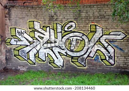 SAINT-PETERSBURG, RUSSIA, JULY 23, 2014: Graffiti tagging on a  brick wall in Saint-Petersburg, Russia