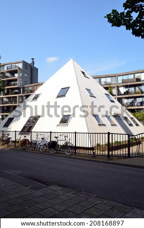 AMSTERDAM, NETHERLANDS - JULY 27, 2014: Pyramid. Modern architecture in  Amsterdam, Holland