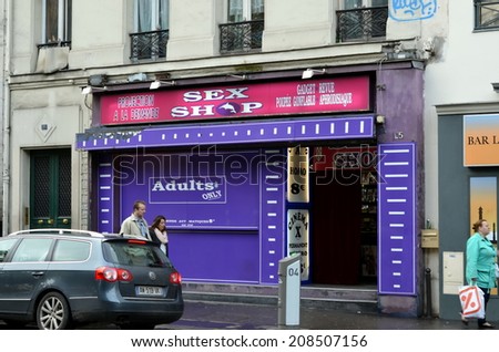 PARIS, FRANCE, OCTOBER 20, 2013: Sex shops in the Paris red-light district of Pigalle