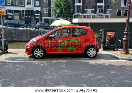 AMSTERDAM, HOLLAND - NETHERLANDS - JULY 27, 2014: Electric vehicle of company \