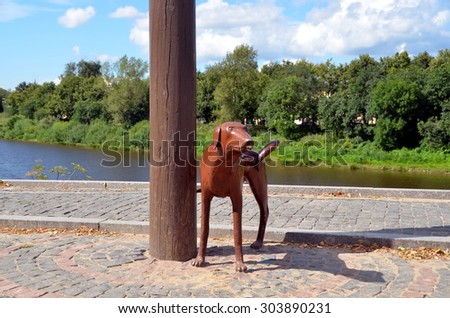 VOLOGDA, RUSSIA - JULY 30, 2015 - Monument to the first electric lamp post in the city of Vologda. Townspeople call it monument to pissing dog