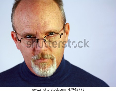 Man with glasses and goatee