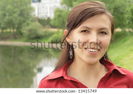 portrait of happiness woman against nature background