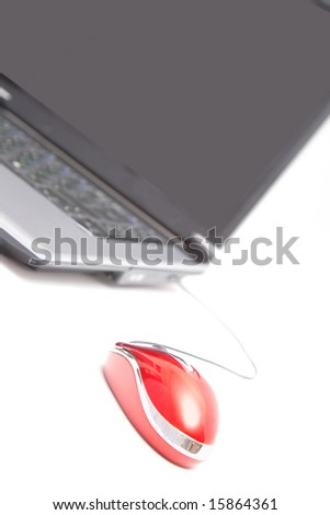 personal computer and red mouse over white