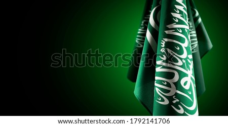 Saudi Arabia flags with a light from behind, use it for national day and country national occasions.