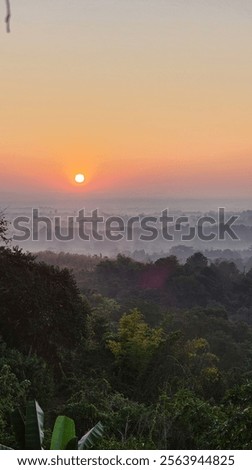 Similar – Foto Bild Schöner Sonnenaufgang im Winter. Landschaft mit dem Meer wird von der aufgehenden Sonne beleuchtet.